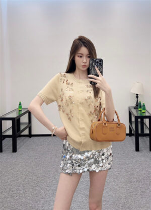 MIUMIU 미우미우 반팔가디건 5061084